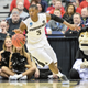Kris Dunn of the Providence Friars controls the ball during a game March 20, 2015, in Columbus, Ohio.
Jamie Sabau/Getty Images